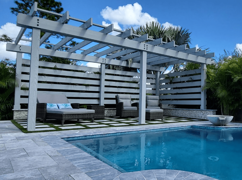 Poolside pergola with seating and clear sky