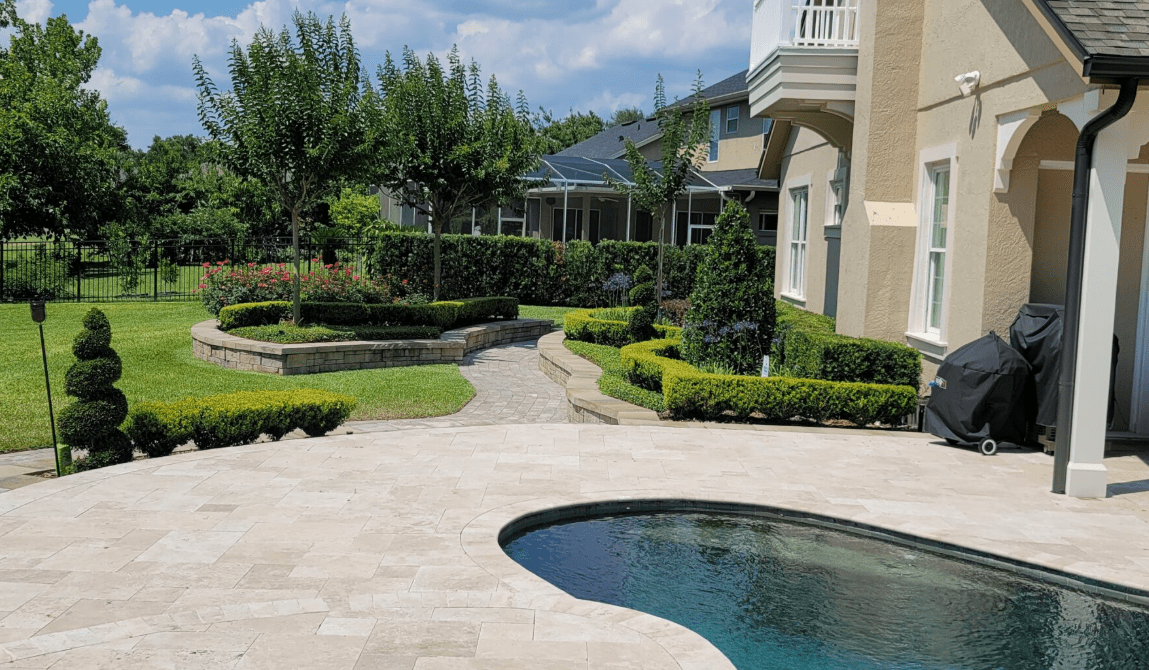Modern home with landscaped yard and pool