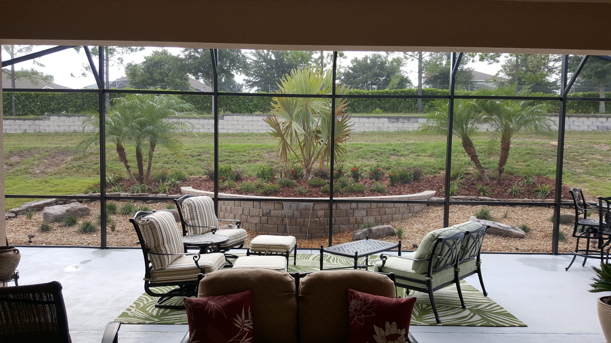 Patio with seating and garden view.