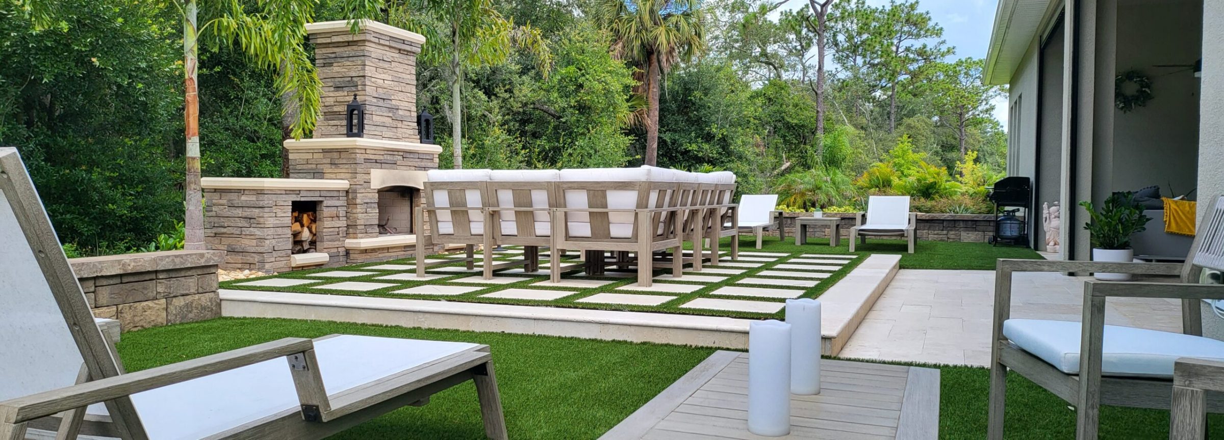 Outdoor patio with fireplace and seating